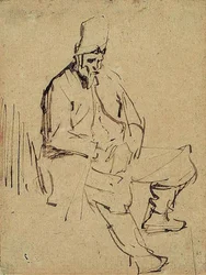 Hombre sentado con un gorro alto